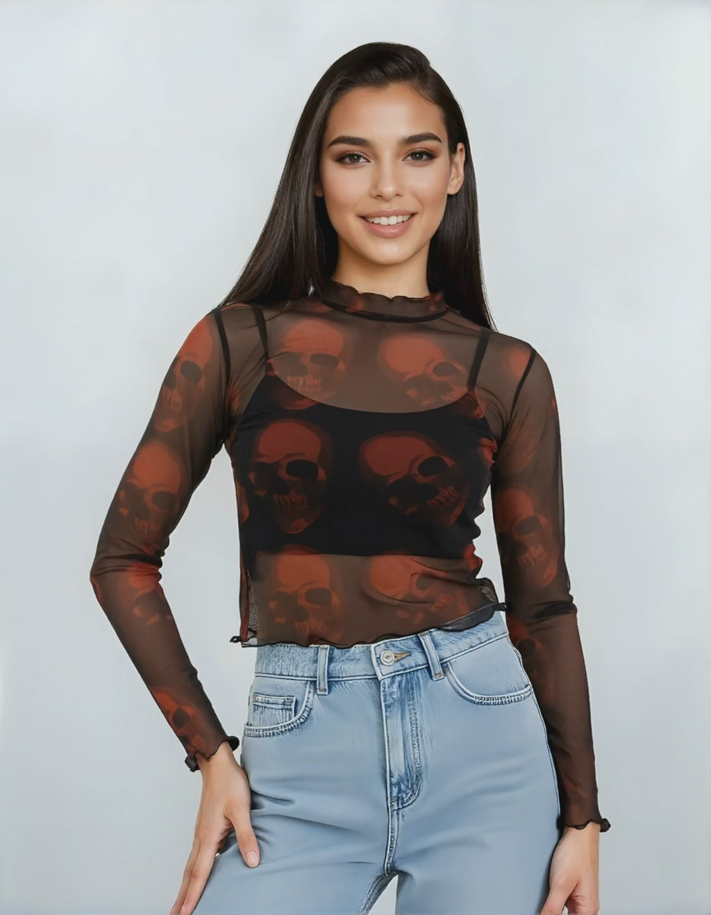 Haut transparent noir à têtes de mort